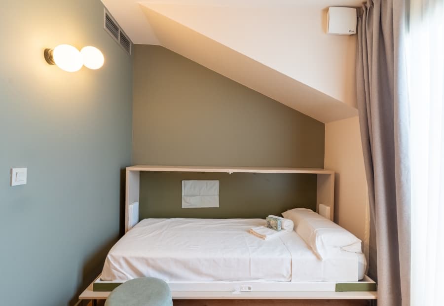 Habitación triple superior con cama supletoria desplegable